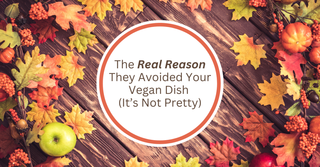 Fall-themed Thanksgiving table with autumn leaves, apples, pumpkins, and berries surrounding a white circle that reads “The Real Reason They Avoided Your Vegan Dish (It’s Not Pretty).”